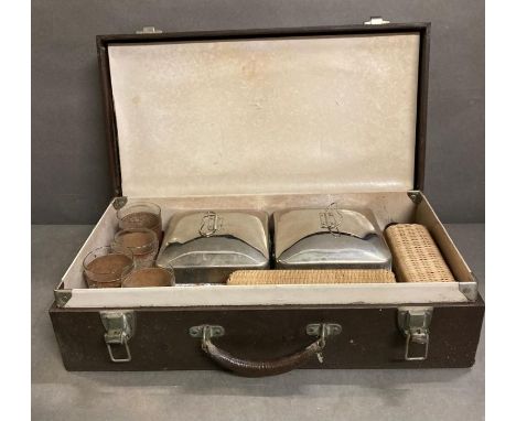 A cased vintage picnic set to include glasses, bottles and food containers AF