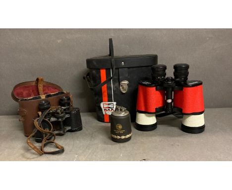 A pair of Champion Racing binoculars and 50th anniversary table lighter and a pair of Lupica field glasses