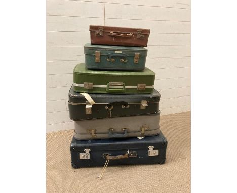 Six vintage suitcases, ideal for display or as prop 