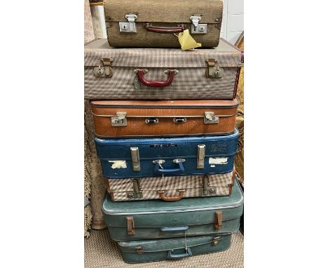 Seven vintage suitcases, ideal display or props 