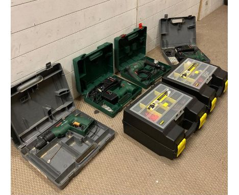 A selection of power tools by Bosch and two Stanley work boxes 