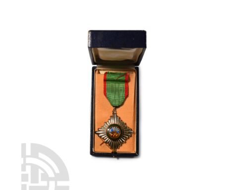 1939-1979 A.D. With 'reef knot' loop and ring and silk ribbon. Obv: 25mm diameter hand enamelled central disc depicting the r