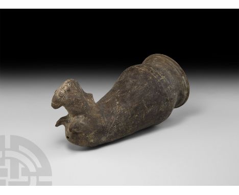 5th-3rd century B.C. Of bulbous tubular form and with a flared mouth, tapering to the foreparts of a horse with detailing to 
