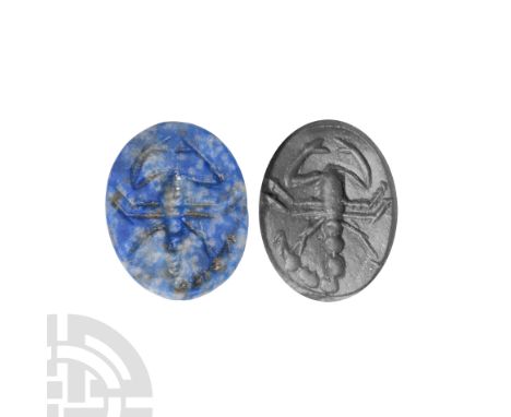 2nd-4th century A.D. or later. Composed of an oval-shaped body, possibly sodalite, displaying an intaglio scorpion; accompani