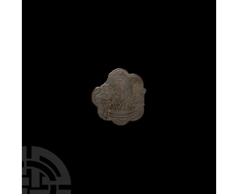 16th century A.D. or earlier. High-tinned with a flat-section octofoil body, engraved with three nimbate figures in a boat, i