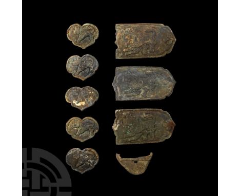10th-12th century A.D. Comprising three mounts with bounding lion motifs, five heart-shaped mounts also showing leaping lions