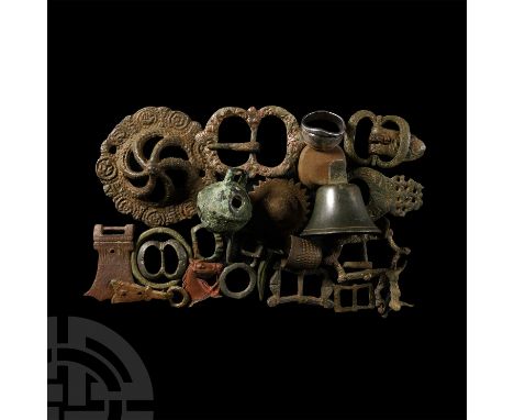 Circa 15th-20th century A.D. Comprising: bells; buckles; decorative fittings and mounts; thimble; heart-shaped mount; ring st