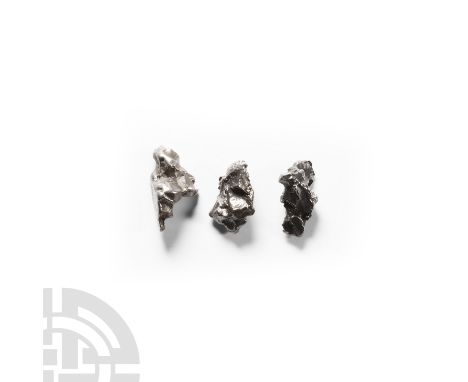 Fell 6000-5000 years B.P. A trio of differently sized nickel iron (IAB) meteorites with a composition of 92.9% iron, 6.7% nic
