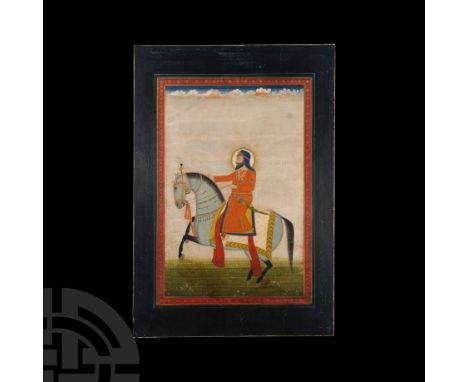 Circa 1860-1870 A.D. The figure advancing left on a dappled stallion, framed by a broad midnight blue and floral border. 47 g
