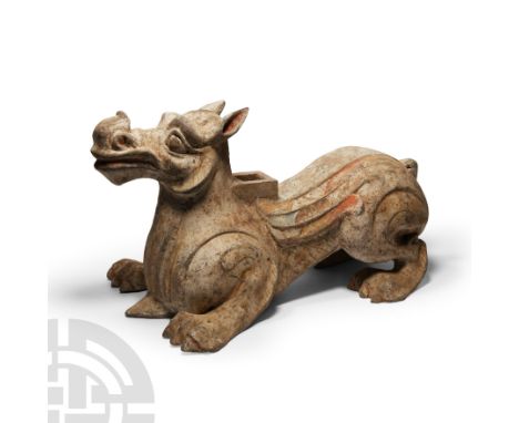 Tang Dynasty, 618-907 A.D. Elongated piriform body with fluted panels to the chest and flanks, white and red pigment, square 