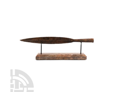 9th-11th century A.D. Comprising a leaf-shaped blade with lozenge cross-section, raised midrib, closed tubular socket; accomp