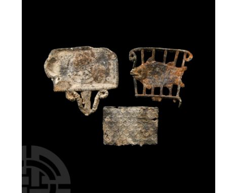 16th-17th century A.D. Comprising: an openwork griddle with fish; rectangular example with openwork volute lug and beaded des