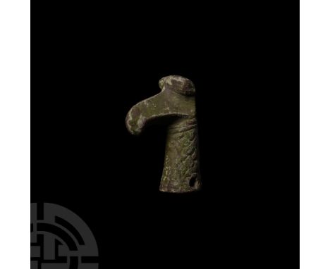 9th-11th century A.D. Displaying stylised feather, head and beak detailing; one piercing to neck for attachment; hollow-forme