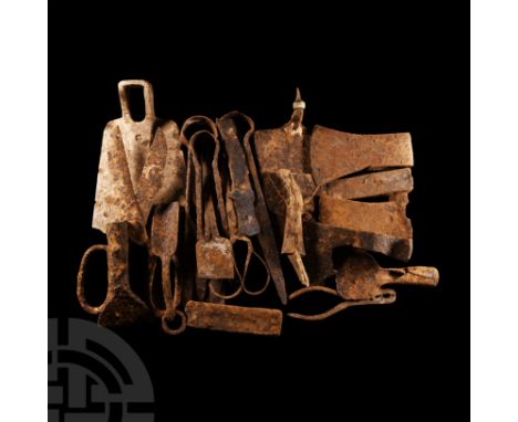 14th-16th century A.D. Mainly comprising shears; axeheads; scissors and other tools. 7.2 kg total, 13.5-30 cm (5 1/4 - 11 3/4
