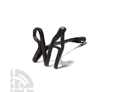 Circa 3rd-6th century A.D. Displaying a monogram composed of Latin letters A and R; tapering round-section socket. See Baratt