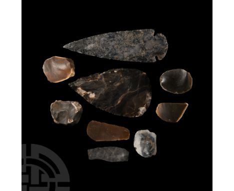 Circa 4th millennium B.C. and later. Group comprising: six mixed Neolithic scrapers and a blade; with two replica bifacial fl