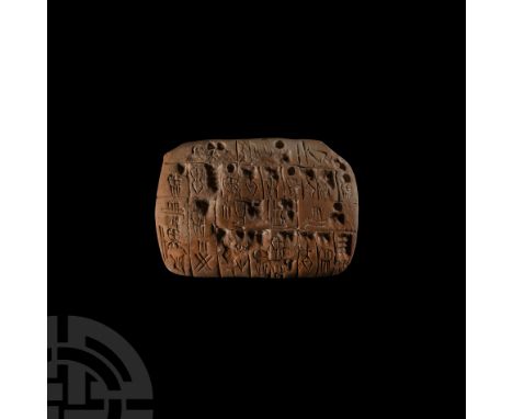 Circa 3000 B.C. Bearing pictographs to the two principal faces; of pillow-shaped form. Cf. similar item in the British Museum