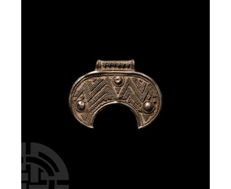 10th-12th century A.D. Of crescentic form and of Northern European type (also widespread in the historical Rus region), with 