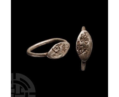 7th-4th century B.C. With scaphoid bezel, incuse image of an armoured warrior with shield and spear, a horseman and a hatched