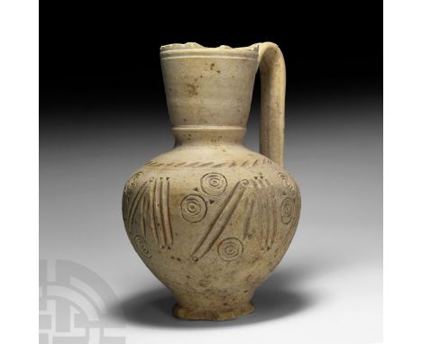 Circa 14th-16th century A.D. The bulbous body with impressed whorl, pellet, bar and other ornament, ropework ring to the shou
