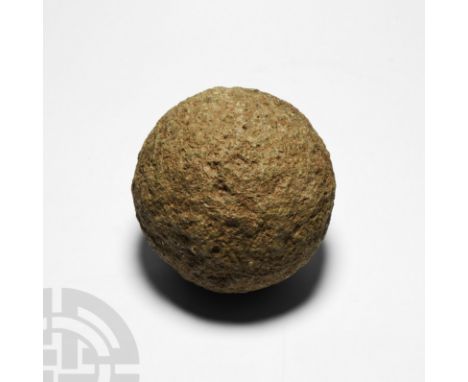 1st-3rd century A.D. Suitable for use with an onager or other catapult-type siege weapon; with roughened, abrasive surface. S