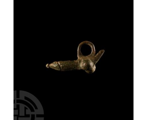 1st-3rd century A.D. Modelled with stylised anatomical detailing with an integral suspension loop, short 'tail' emerging behi