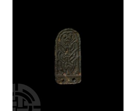 10th-11th century A.D. Comprising a tongue-shaped body, panel of reserved tendril interlace to one face, ring-and-dot motifs 