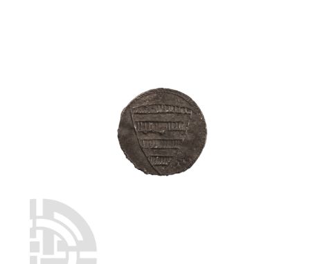 Circa 14th-15th century A.D. One face displaying a shield in relief bearing horizontal lines; an antlered deer pursued by an 