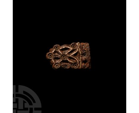 9th-11th century A.D. Punch-decorated with ring-and-dot motifs with shallow cells between. 45.8 grams, 44 mm (1 3/4 in.). Fro