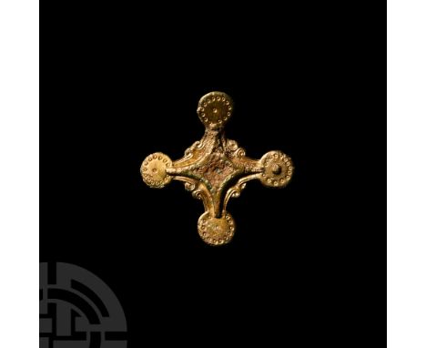 6th-7th century A.D. Or casket mount, each arm terminating in a discoid plaque with a ring of punched pellets, the arms with 