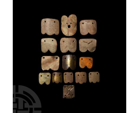 5th-9th century A.D. Each scale B-shaped, slightly convex sides, two equally spaced circular holes along the straight edge. C