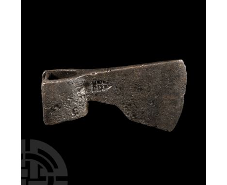 14th-15th century A.D. Stamped to one face with work smith's mark, angled lower cheek edge and a sub-oval socket. See Glosek,