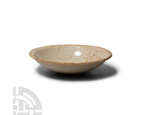 Song Dynasty, 960-1279 A.D. or later. Formed with a gently tapering convex sidewall, everted rim and ring foot. 138 grams, 14