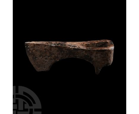 11th-13th century A.D. Finno-Ugrian with curved blade, swept rear edge, square chin, socket with downwards flanged sides. Cf.