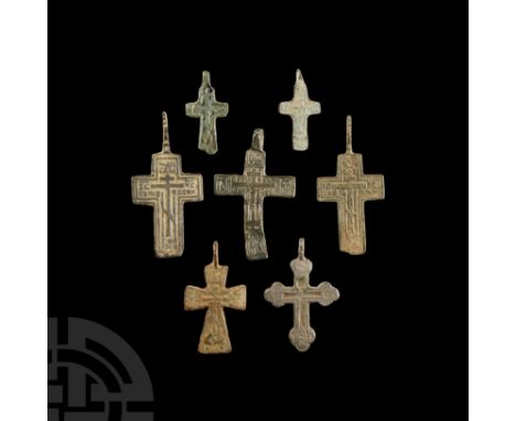 18th-19th century A.D. Comprising seven crosses of different varieties, each with suspension loops, many with bifacial design