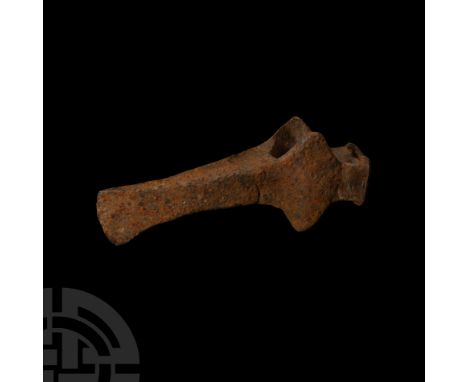 11th-12th century A.D. Composed of a sub-circular socket, lozengiform flanges above and below, rectangular hammer-style butt 