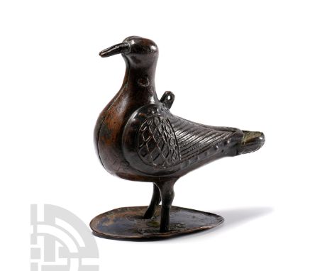 Circa 1200-1230 A.D. or later. Modelled in the round, hollow formed with stylised geometric detailing to the wings rendered i