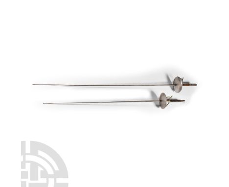 Circa 1900 A.D. Each with a long and narrow blade, the longer of square section, the shorter rectangular, each fitted with tr