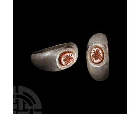 2nd-3rd century A.D. Broad hoop with inset carnelian intaglio of a bee. Cf. Ruseva-Slokoska, L., Roman Jewellery, Sofia, 1991