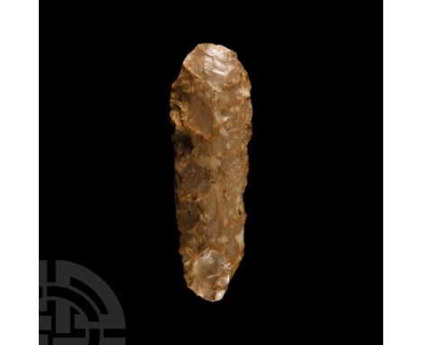 Neolithic Period, 4th-3rd millennium B.C. Bifacially knapped axe with convex cutting edge tapering with thin edges to a round