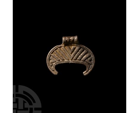 8th-10th century A.D. Comprising a ribbed suspension loop, surface divided into panels of granule clusters. Cf. Sedov, B.B., 