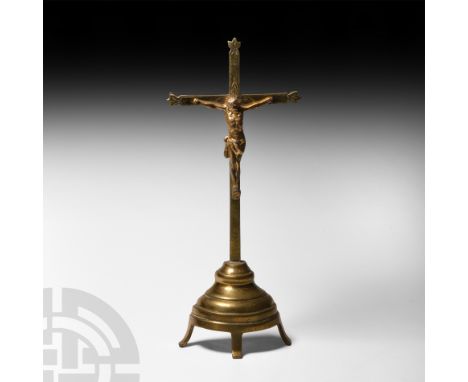 19th century A.D. Set on a free-standing base with hollow reverse, skull and crossed bone and floral detailing to the cross a