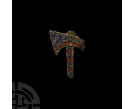 2nd century A.D. Complete with pin and catchplate to reverse; the axe decorated with blue and red enamel fill. 3.17 grams, 26