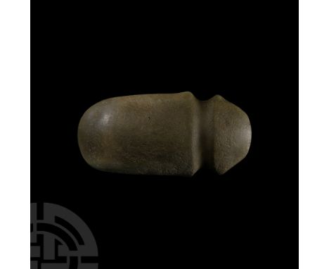 Neolithic, 6th-3rd millennium B.C. Lentoid in section with tongue-shaped cheeks, shallow groove to neck and broadly trapezoid