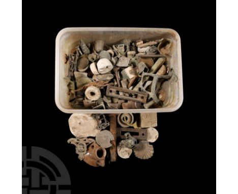 20th century A.D. and earlier. Comprising: buttons; coins; a bone comb; buckles; weights; tokens; musket balls; thimbles and 