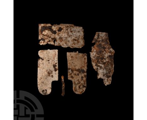Circa 14th-16th century A.D. Comprising curved and flat plates, some incorporating shaped regions, raised borders and seized 