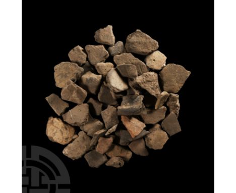 Neolithic Period, mid 6th-mid 5th millennium B.C. Comprising 50 shards from Linear Band Ware Pottery Culture. 200 grams total
