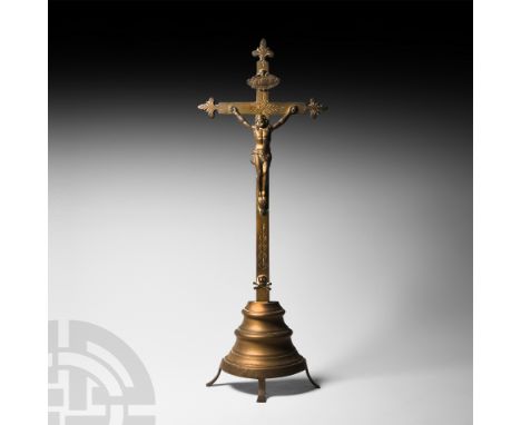 19th century A.D. Set on a free-standing base with hollow reverse, the cross with skull and crossed bone detailing and a plaq