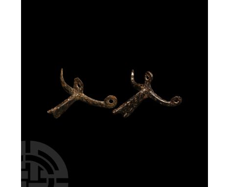 2nd-3rd century A.D. With central barbed spike positioned under the pierced central hole, fitted on both sides with arms havi