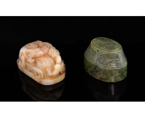 Chinese white and brown mottled uncut jade seal, carved with dragons, 7cm wide, and an oval uncut spinach jade seal carved wi